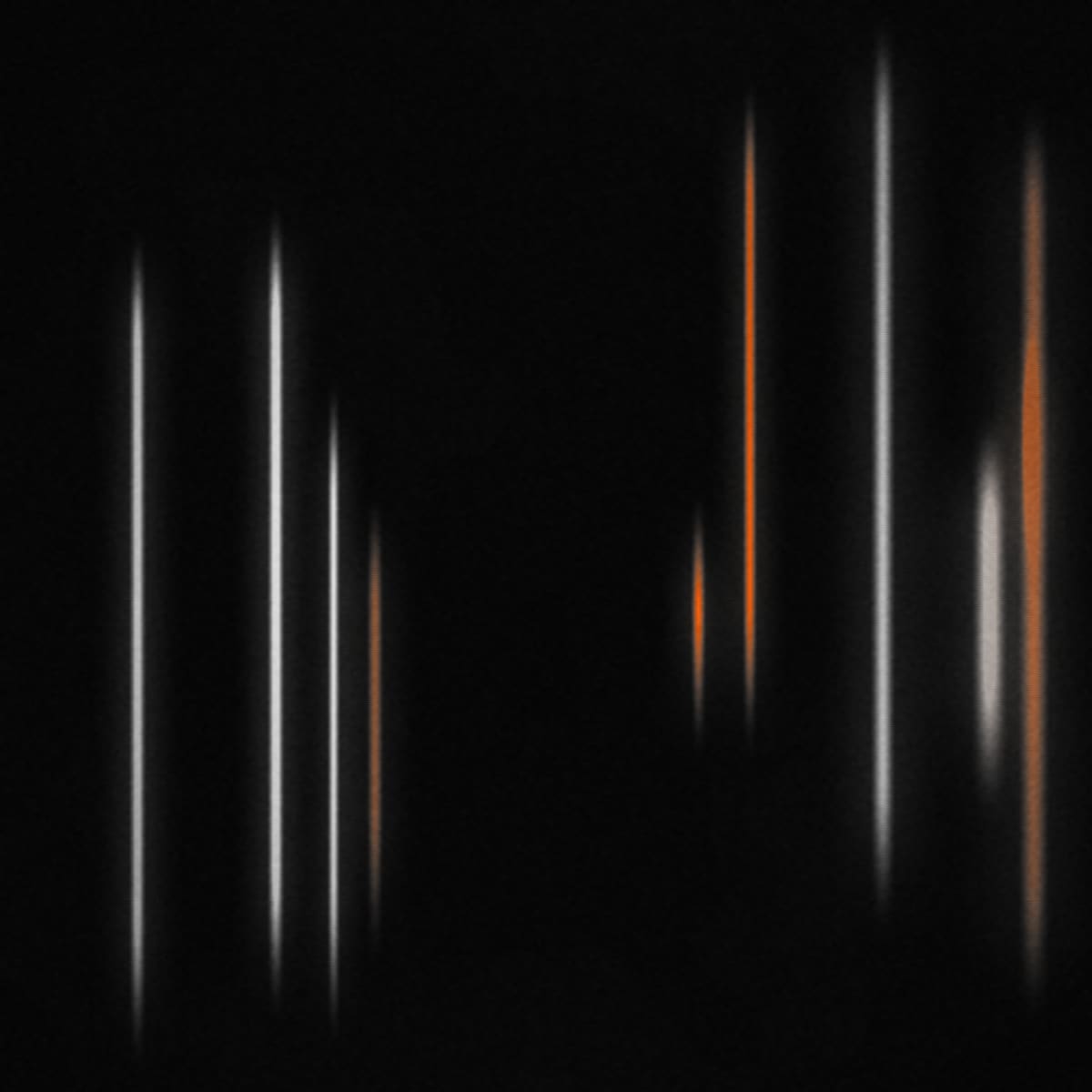 Late Cairo — cover artwork. Blurred vertical light streaks over black.